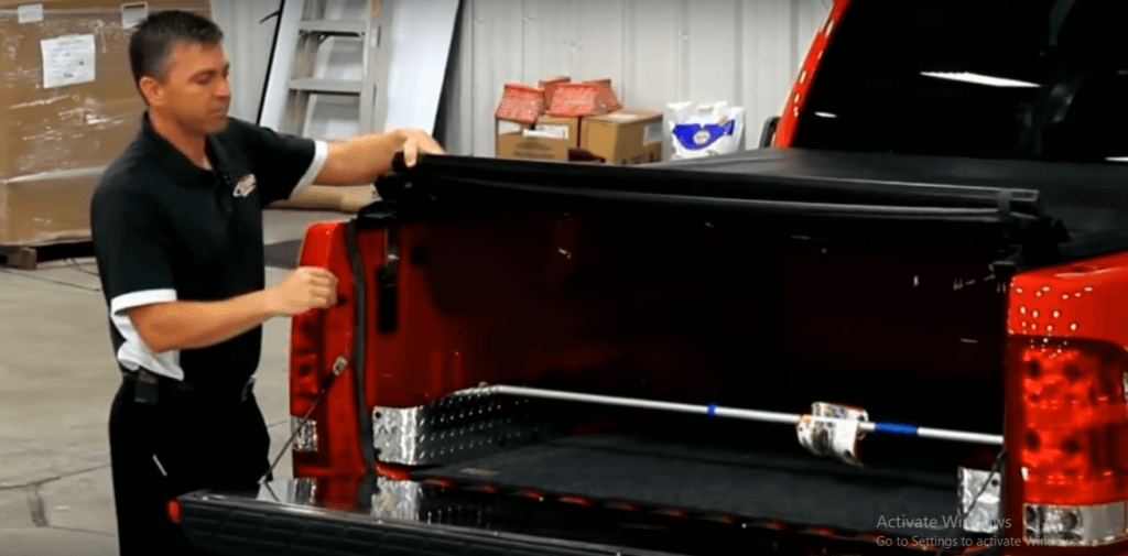 how to open tonneau cover